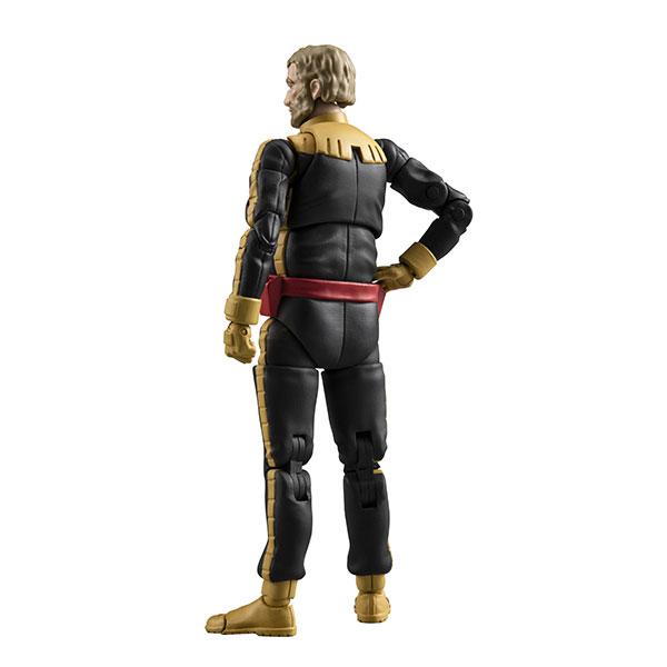 A back view of a black-and-gold armored action figure on a white background.