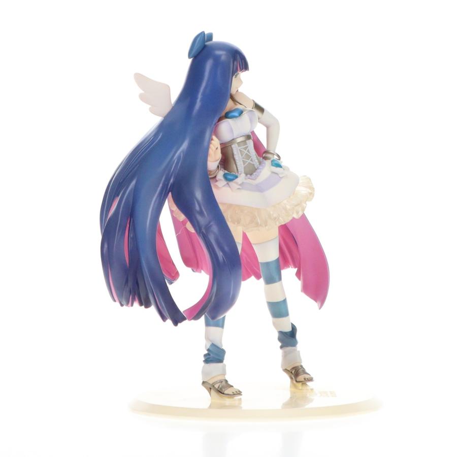 Anime girl figure with long blue hair on a white background