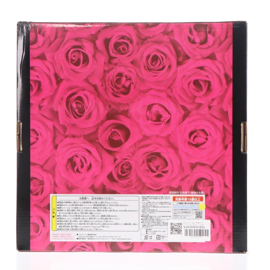 A boxed figure package with a pink rose pattern on the back.