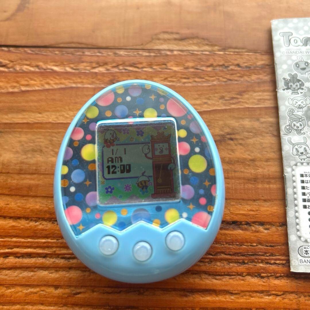 Tamagotchi × M!X Melody Mix Version Blue Color Bandai Limited 20th Anniversary - box and packaging