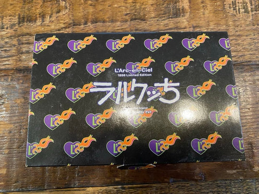 Tamagotchi × L'Arc-en-Ciel Larkutchi Z 1998 Limited Edition Collaboration Goods
