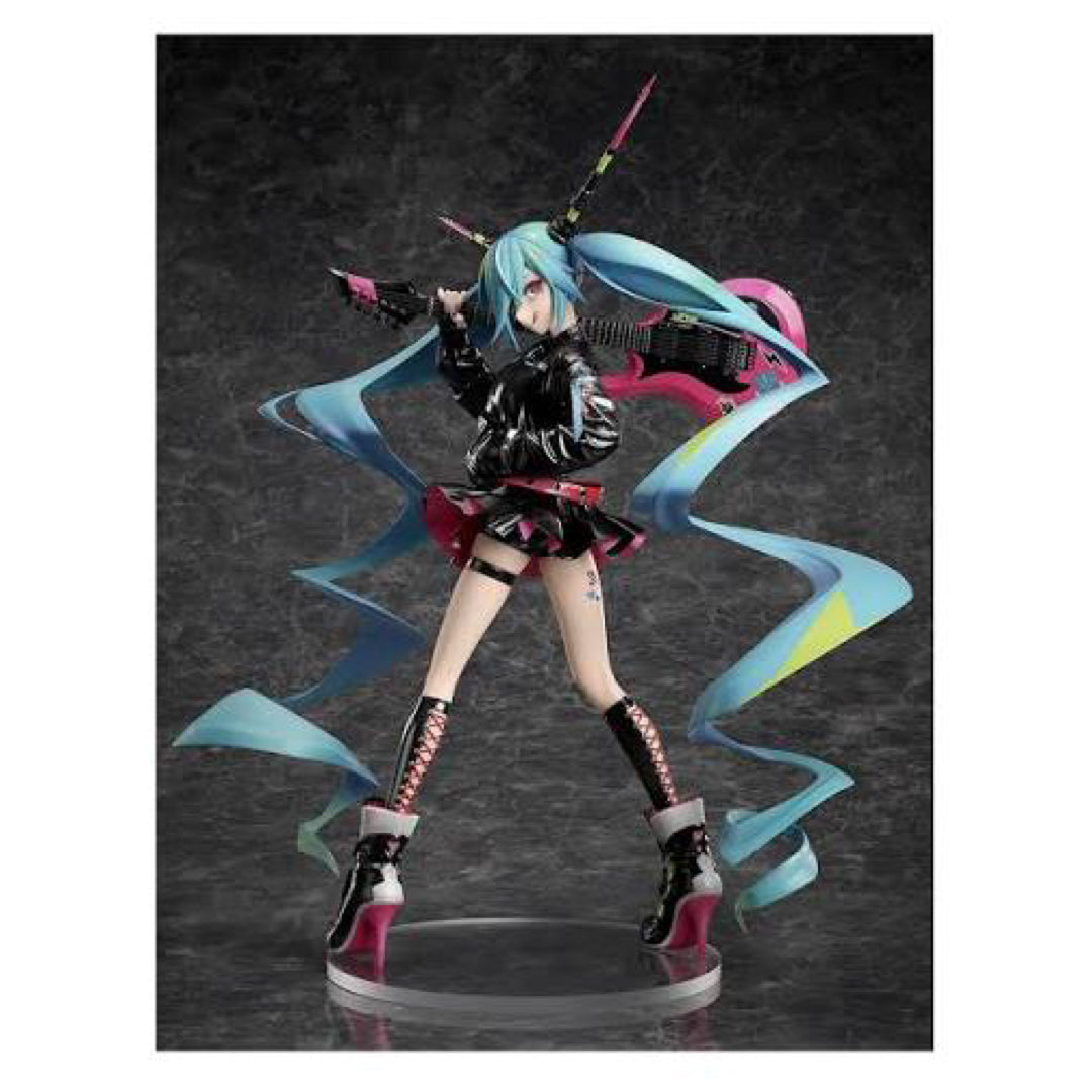 Hatsune Miku figure posed with flowing blue and pink ribbon-like effects on a dark background.