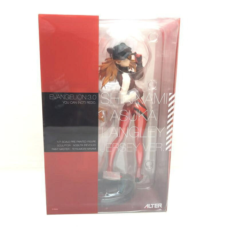 Actual retail box front with the figure visible through the window