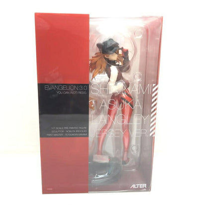 Actual retail box front with the figure visible through the window