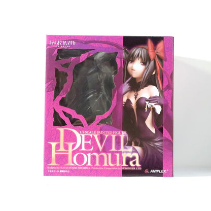A boxed Devu Homura figure with a clear window and character artwork on the front.