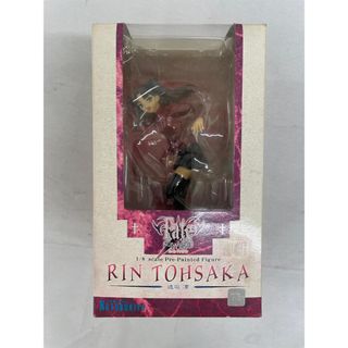 A boxed Tohsaka Rin figure is visible through the front window of the retail package.