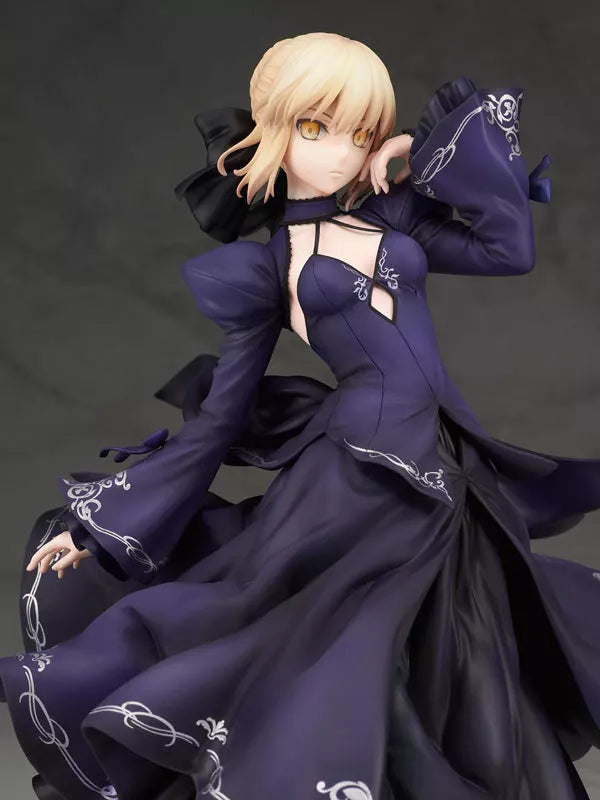 Blonde figure in a dark purple dress against a dark background