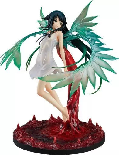 A figure of a black-haired girl in a white dress with large translucent green wings on a red base.