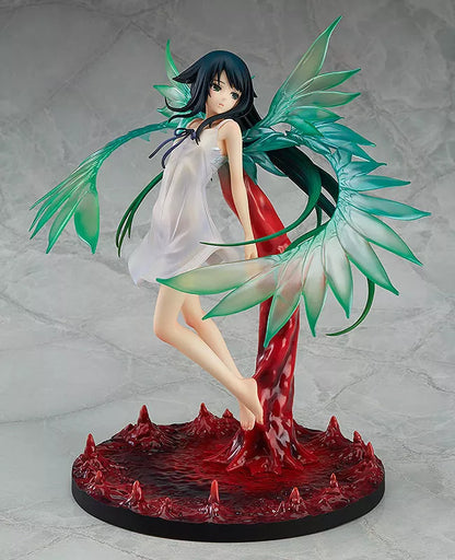 An anime girl figure with translucent green wing-like parts on a red base.