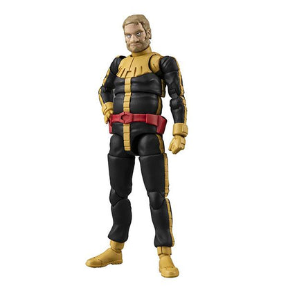 A posed action figure of a blond man in a black and gold suit on a white background.