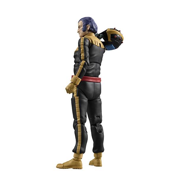 A side-view figure of a blue-haired man in a black and gold suit holding a helmet over his shoulder.
