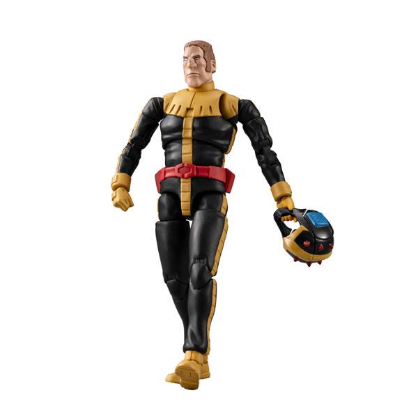 A posed action figure in a black and gold suit holding a helmet on a plain white background.
