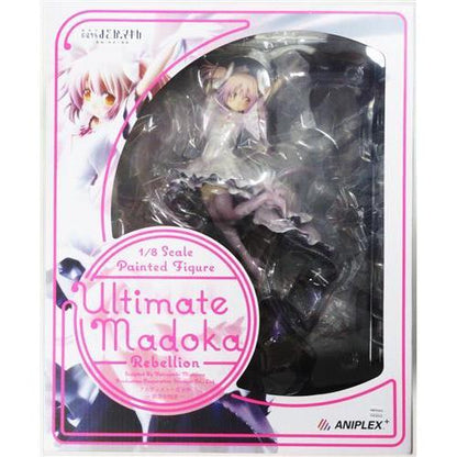 Boxed Ultimate Madoka figure visible through the clear window.