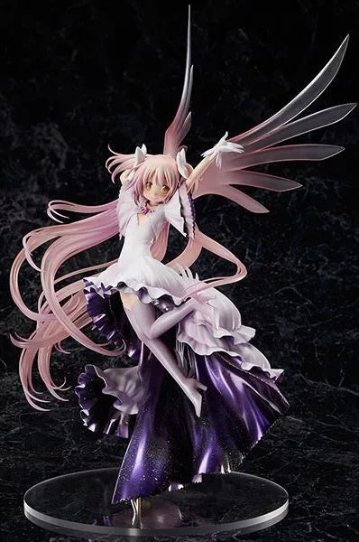 Pink-haired magical girl figure posed on a clear round base against a dark background