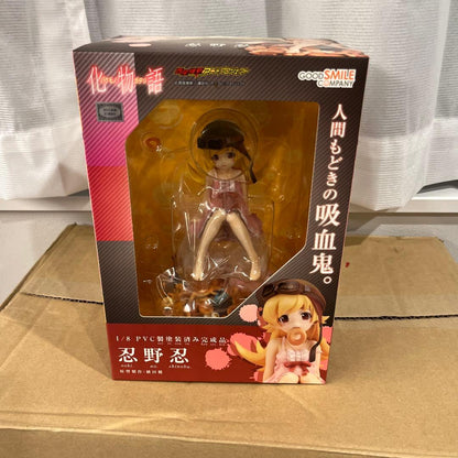 A boxed anime figure of Oshino Shinobu in retail packaging with a clear front window.