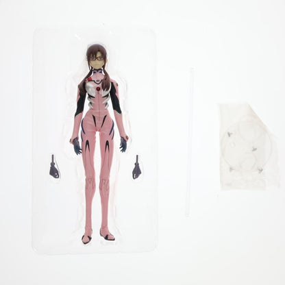 An anime figure in a clear blister tray with extra hands and a stand piece on a white background.
