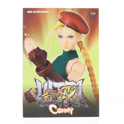 A boxed Cammy figure from Ultra Street Fighter IV on a white background.