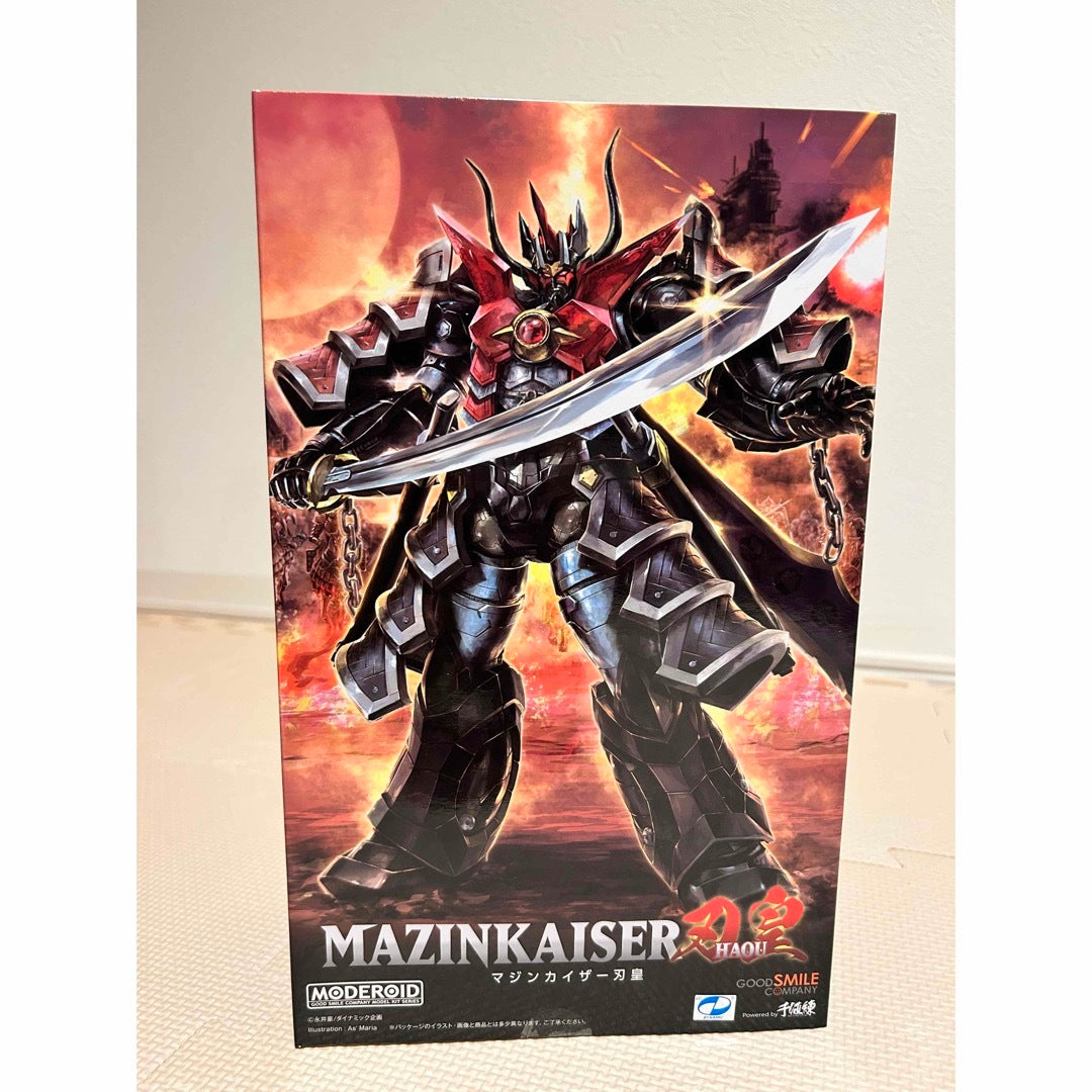 A model kit box standing upright, showing Mazinkaiser Haou artwork on the front.