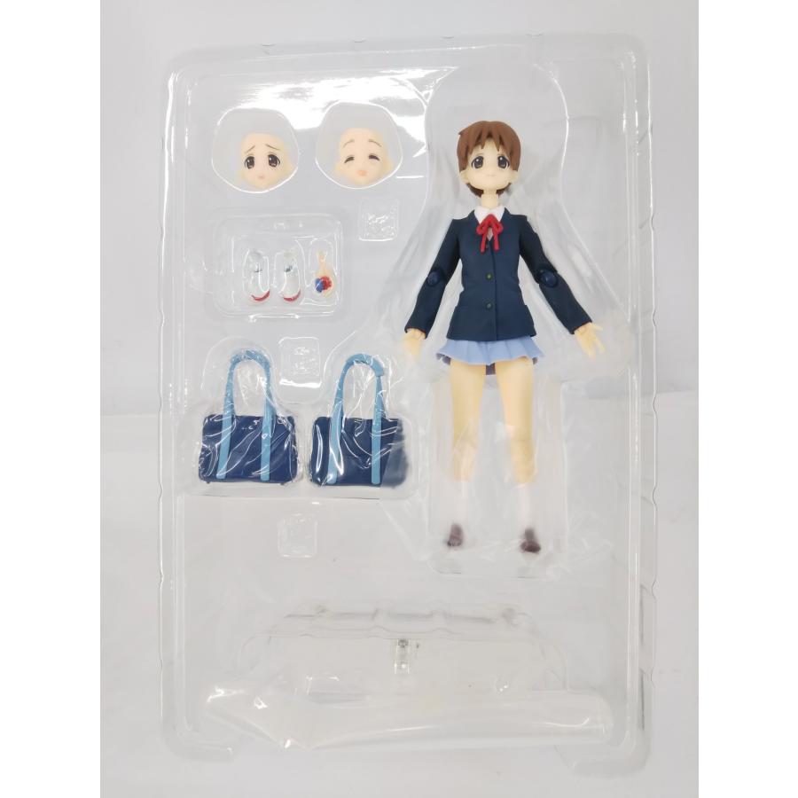 Ui Hirasawa school uniform figure in a clear blister with alternate faces, hands, school bags and stand.