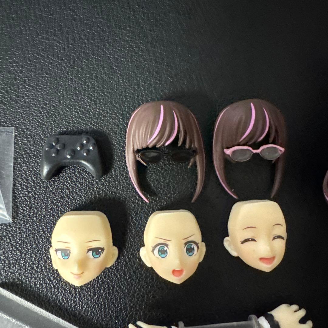 Figma Kizuna Ai Figure Max Factory - Interchangeable faces and accessories. Reference photograph of the same model; not the exact unit shipped.