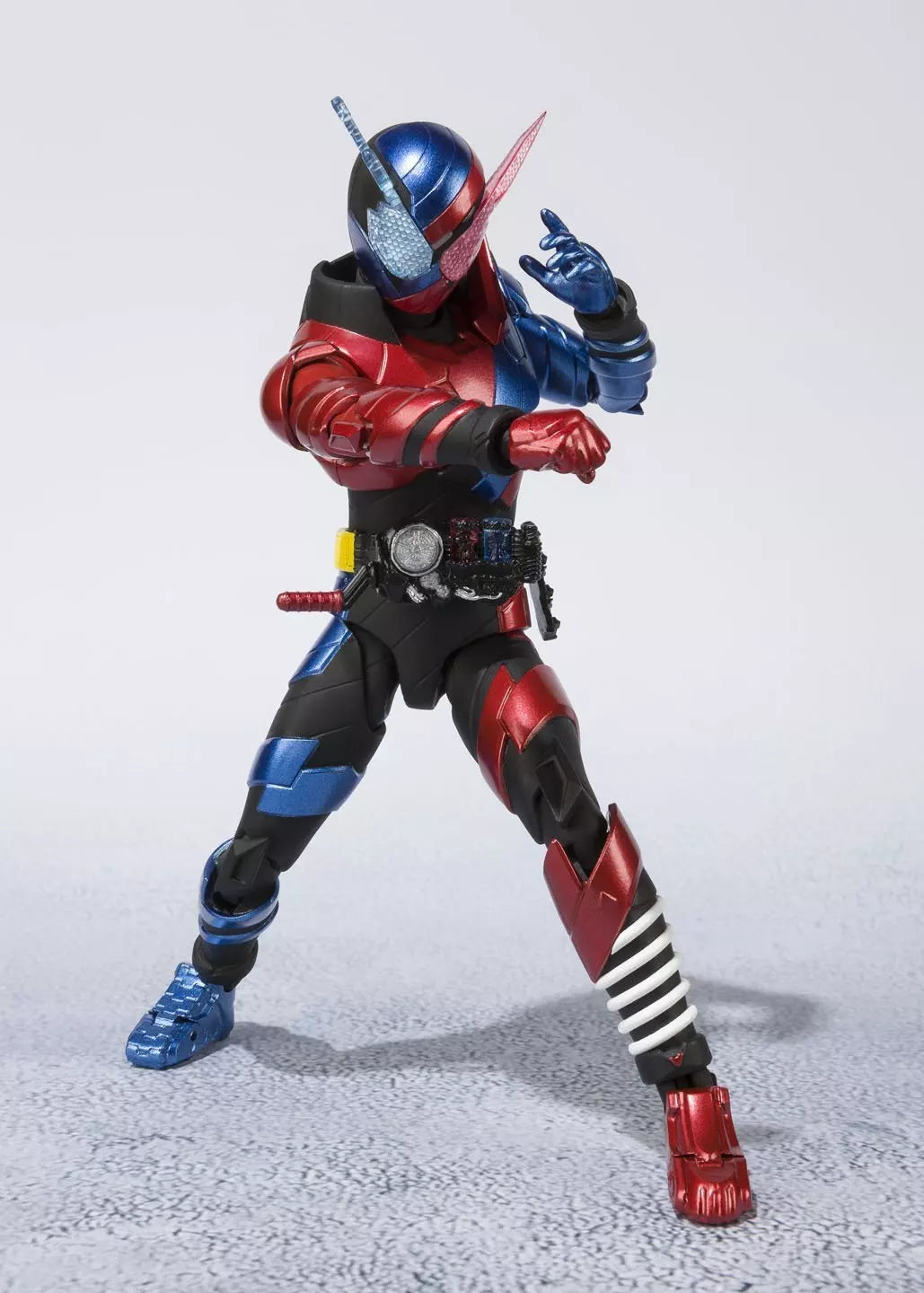 Kamen Rider Build Rabbit Tank Form figure in a fighting pose with red and blue armor.