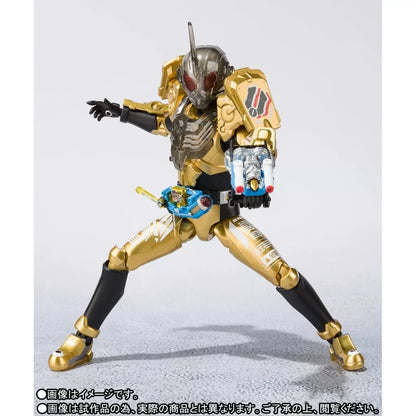 Gold and black Kamen Rider Grease figure posed with legs spread and a wrist-mounted weapon extended.
