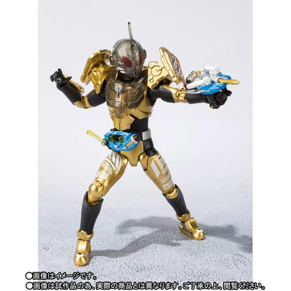 Gold and black Kamen Rider Grease figure posed with a blue and silver weapon on a light background.