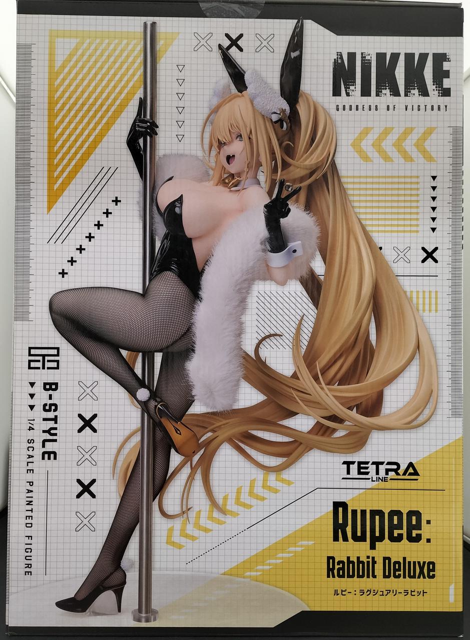 Front of a Rupee Rabbit Deluxe retail box showing the blonde bunny figure posed on a pole.