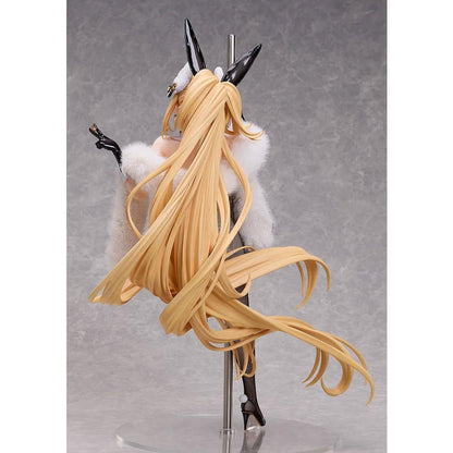 Rear view of a blonde bunny figure with long flowing hair, black ears, white fur wrap and a clear base.