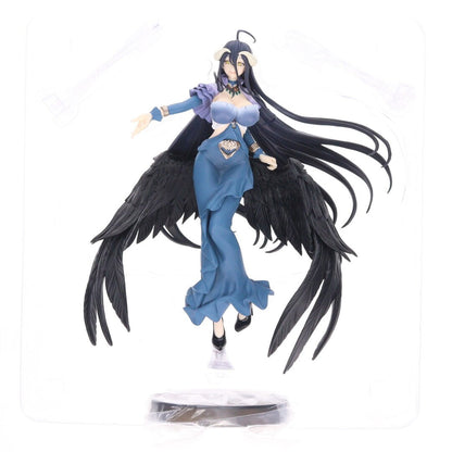 Blue-gowned anime figure with long black hair and black wings, shown in clear plastic packaging on a white bac