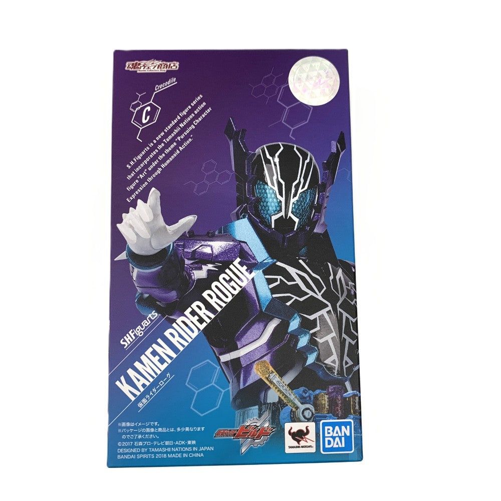 Front of a Kamen Rider Rogue S.H.Figuarts retail box with Tamashii Web Shop logo, on a white background.