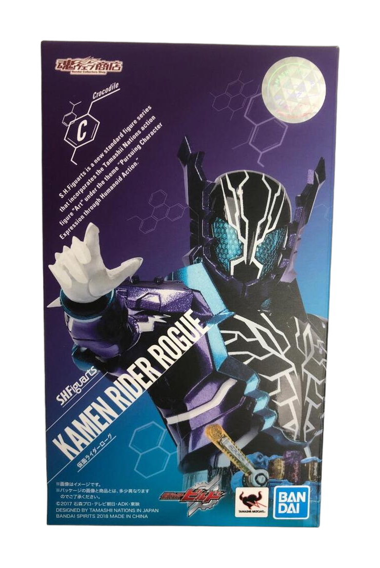 Front of an S.H.Figuarts Kamen Rider Rogue box on a cream surface, with purple and blue character artwork. (cut-out)