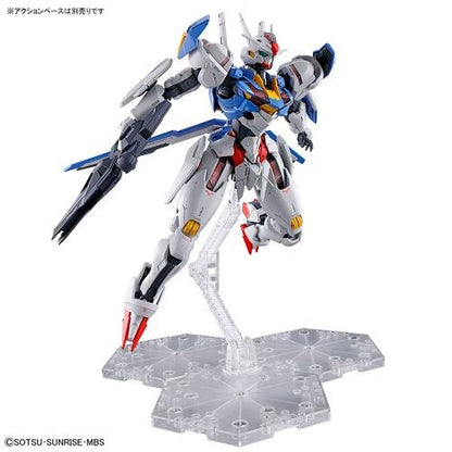 Gundam Aerial posed with a rifle and shield on a clear display stand against a white background.