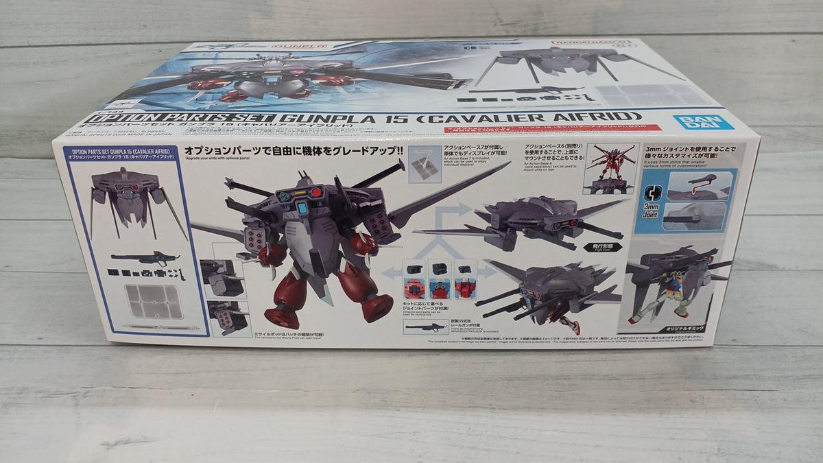 Cavalier Aifrid Option Parts Set Gunpla 15 box showing assembly and attachment examples on a wood surface.