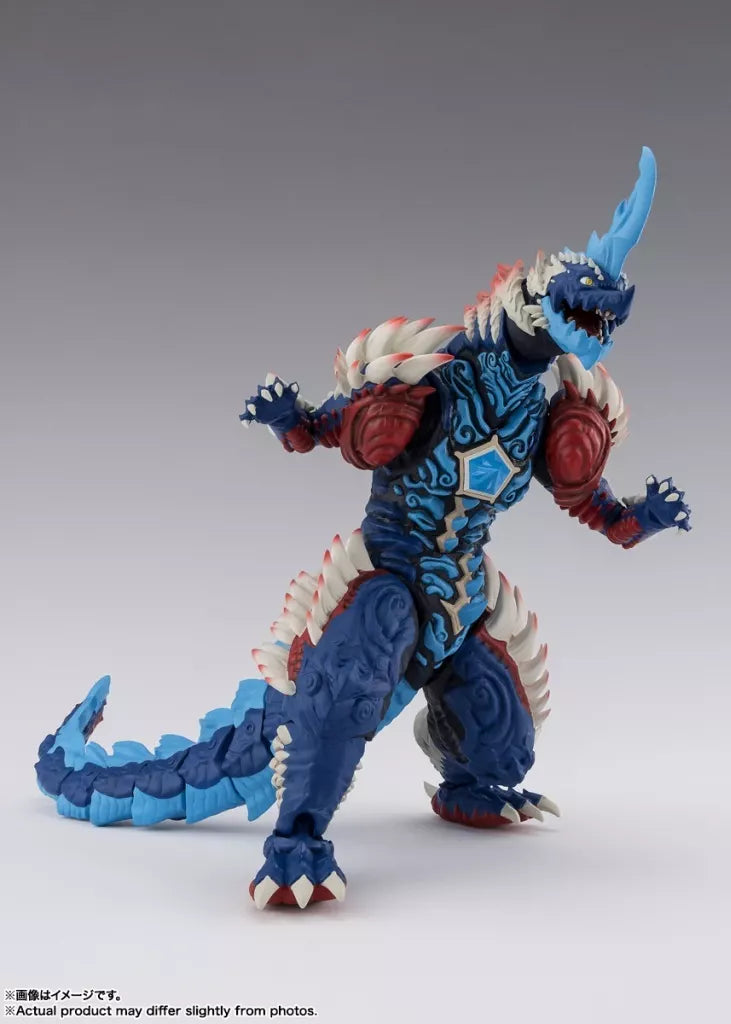 Blue horned monster figure with red shoulders, white spikes, and a long tail in a standing pose.