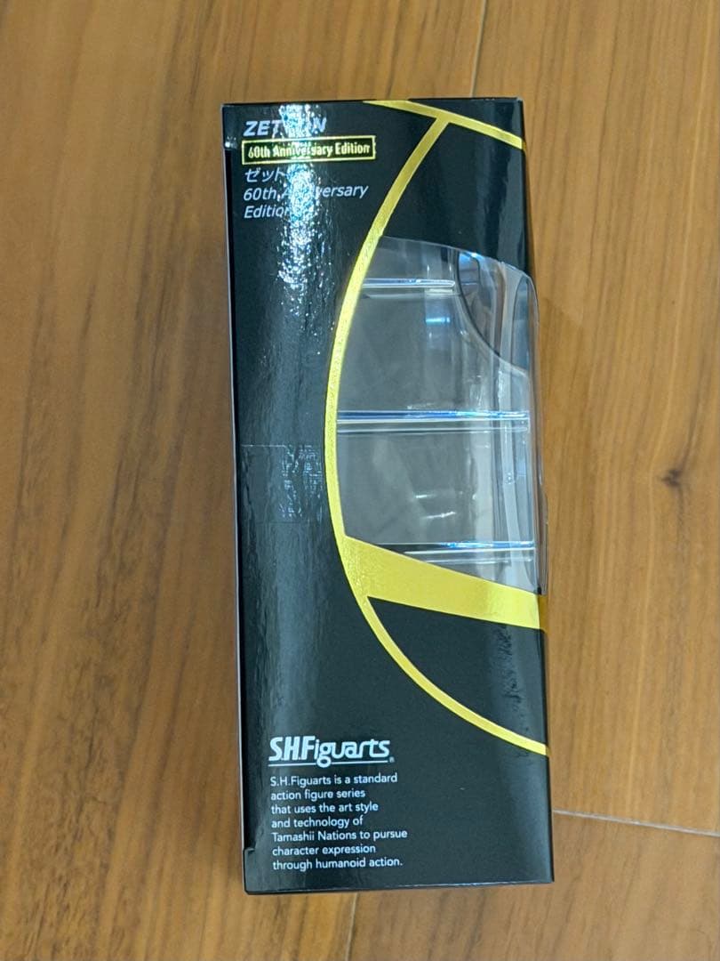 Side view of the S.H.Figuarts Zetton 60th Anniversary Edition box with clear window, actual item photo.