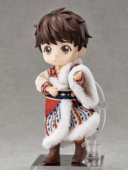 Brown-haired doll in a patterned outfit with white fur trim and brown boots on a clear display stand.