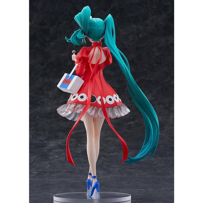 Back view of a Hatsune Miku figure in a red dress with long turquoise twin tails.