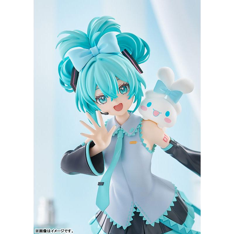Hatsune Miku figure posing with a Cinnamoroll character on her shoulder.