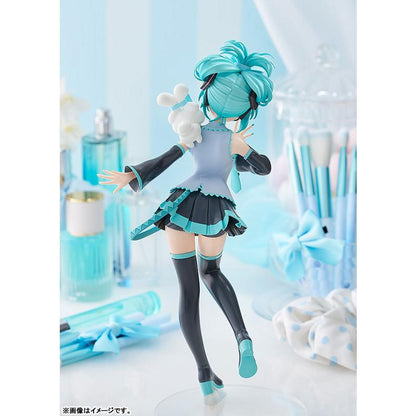Rear view of a Hatsune Miku figure posing with a small Cinnamoroll on her shoulder.