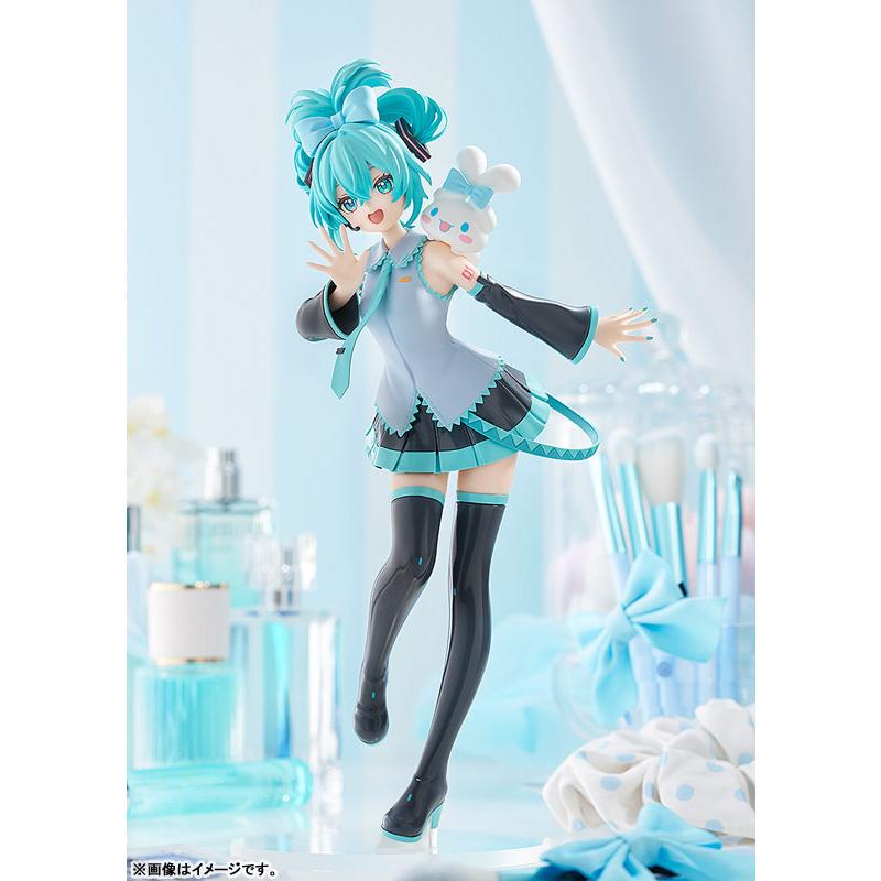 A Hatsune Miku figure posing with a Cinnamoroll plush on her shoulder.