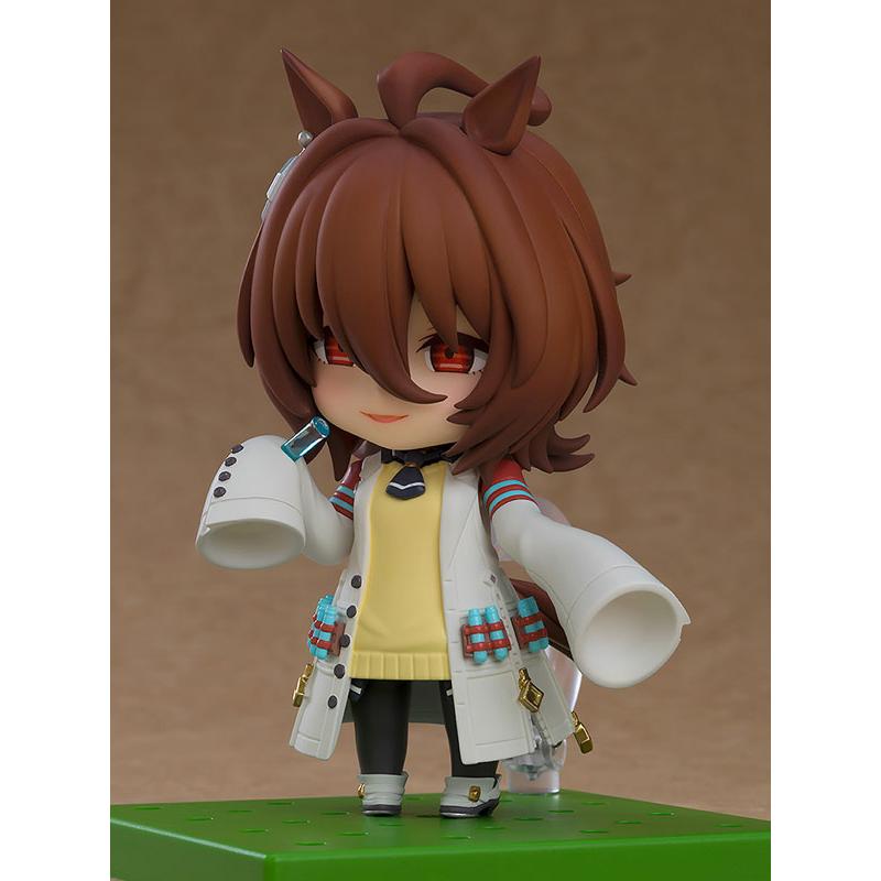 A Nendoroid anime horse girl figure standing on a green base.