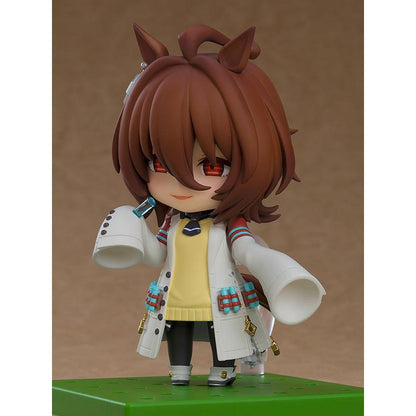 A Nendoroid anime horse girl figure standing on a green base.