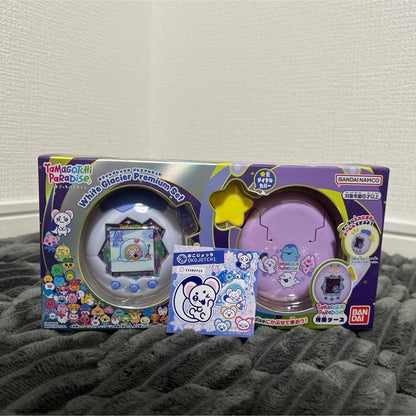Retail box for Tamagotchi Paradise White Glacier Premium Set with accessories shown in front.