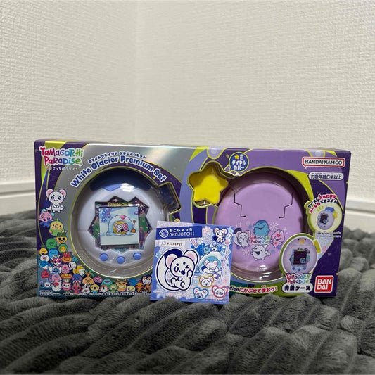 Retail box for Tamagotchi Paradise White Glacier Premium Set with accessories shown in front.