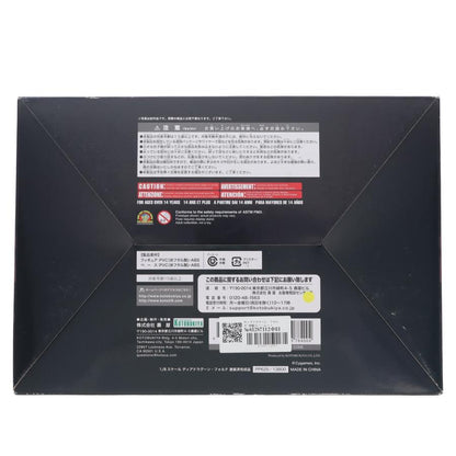 A black figure box shown from the back with labels and warning text.