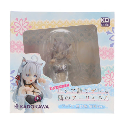 A figure is visible inside its retail box with a clear plastic window.