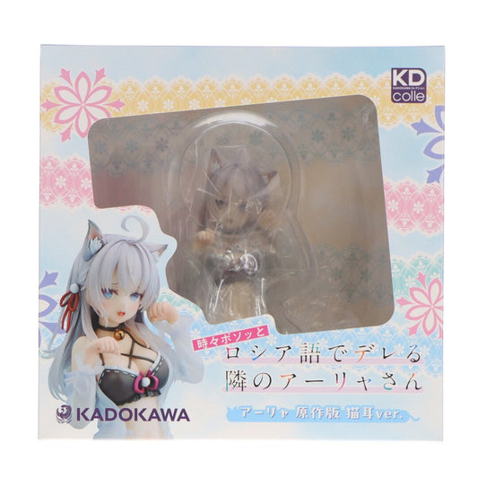 A figure is visible inside its retail box with a clear plastic window.