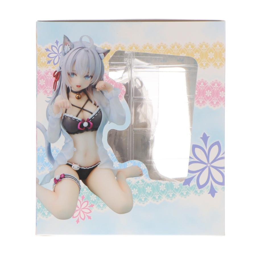 A figure box with a clear window and an illustrated catgirl character on the front.
