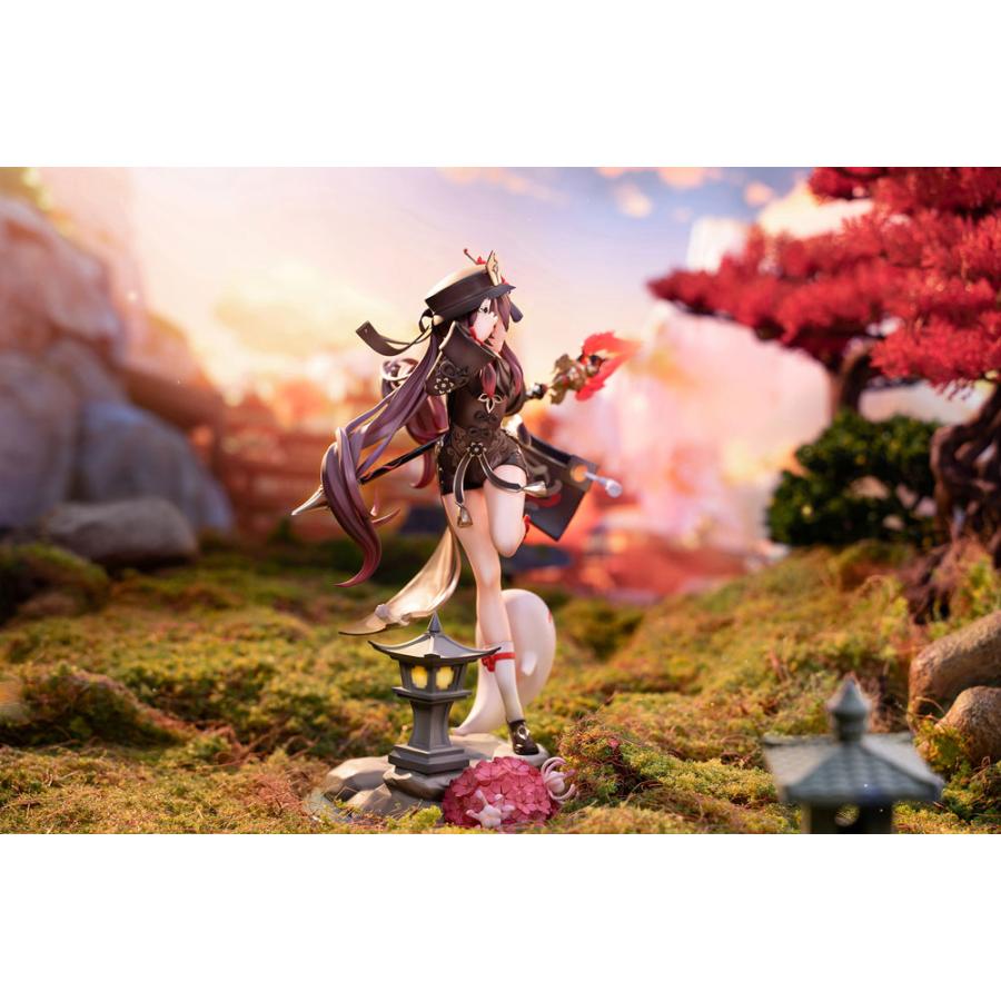 A Hu Tao figure posed on a mossy scenic display with lanterns and red trees.